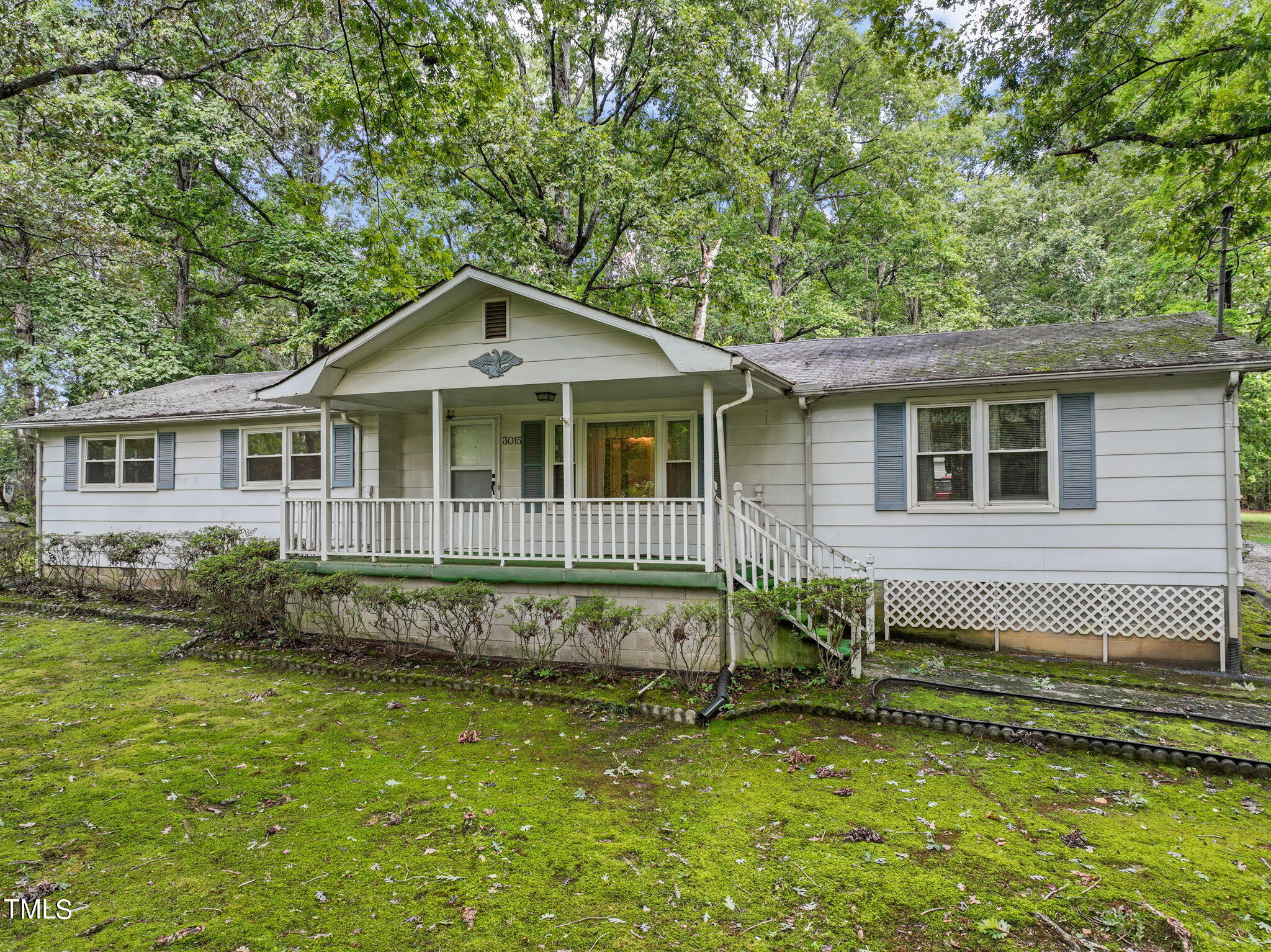 3015 Old Raleigh Road Apex, NC 27502 - Photo 41 of 47 a front view of a house with a garden