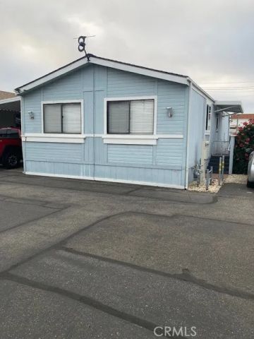 a front view of a house with a garage