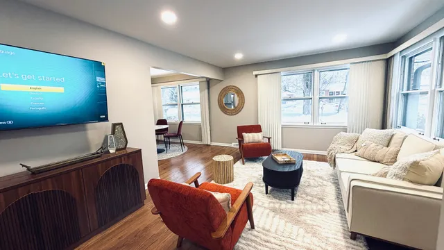 a living room with furniture and a window