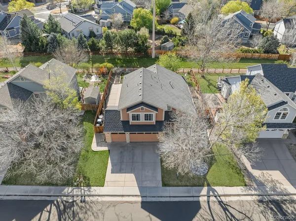 an aerial view of a house with a garden