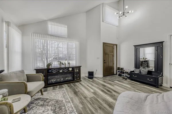 a bedroom with furniture and windows