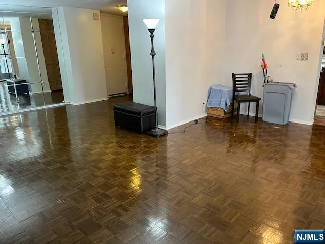 a view of kitchen with furniture and a potted plant