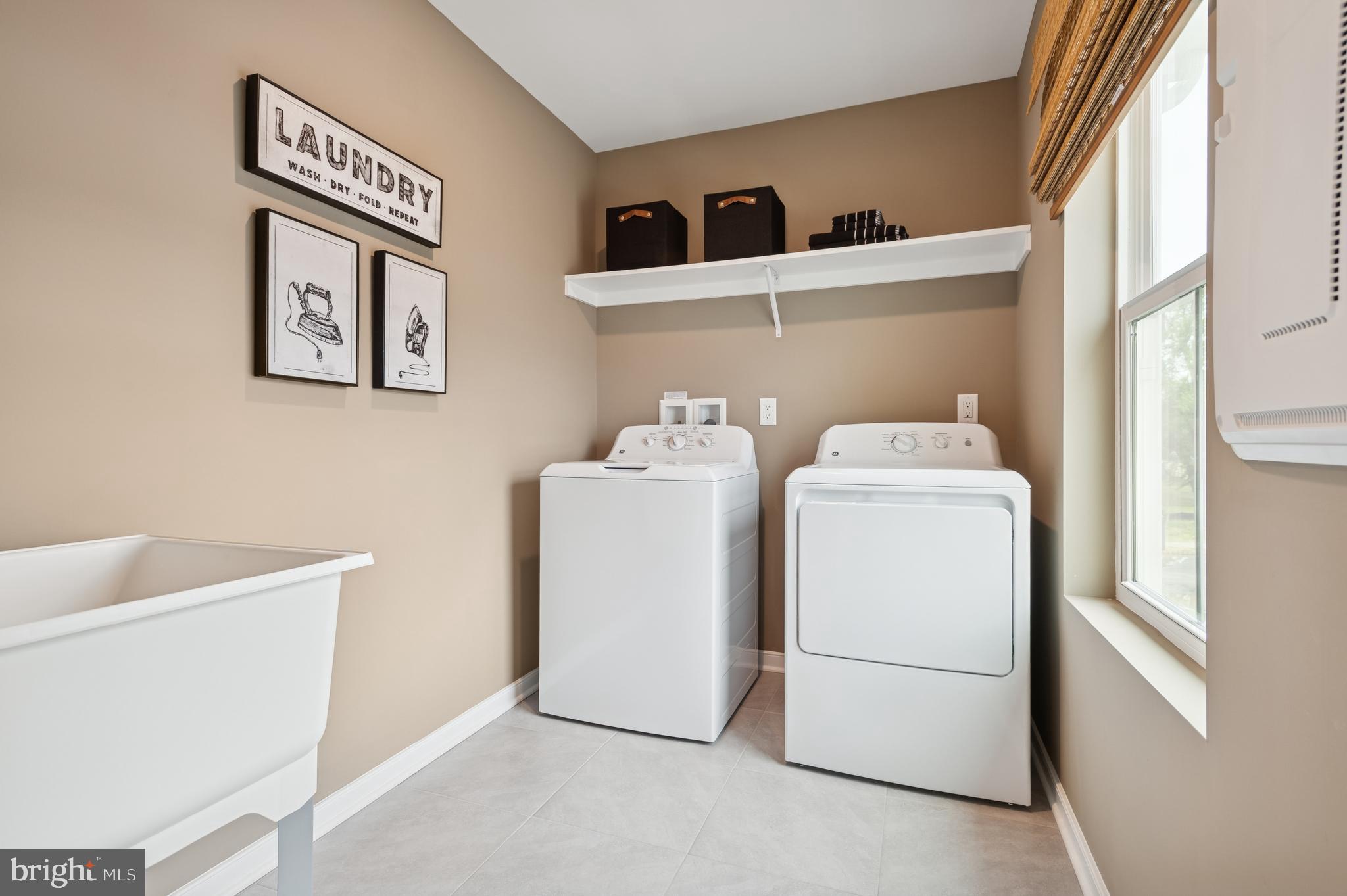 23 Butternut Drive, Unit 12 Berlin, NJ 08009 - Photo 17 of 38 a utility room with dryer and washer