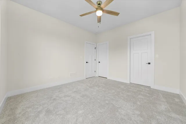 a view of a room with racks on the wall