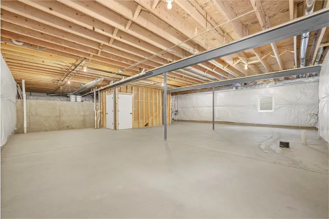 a aerial view of a house with a yard