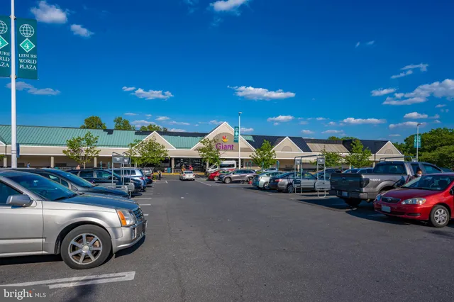 a living room with lots of furniture and a rug