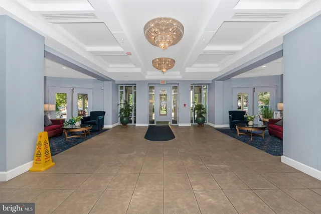 a kitchen with lots of counter top space and furniture