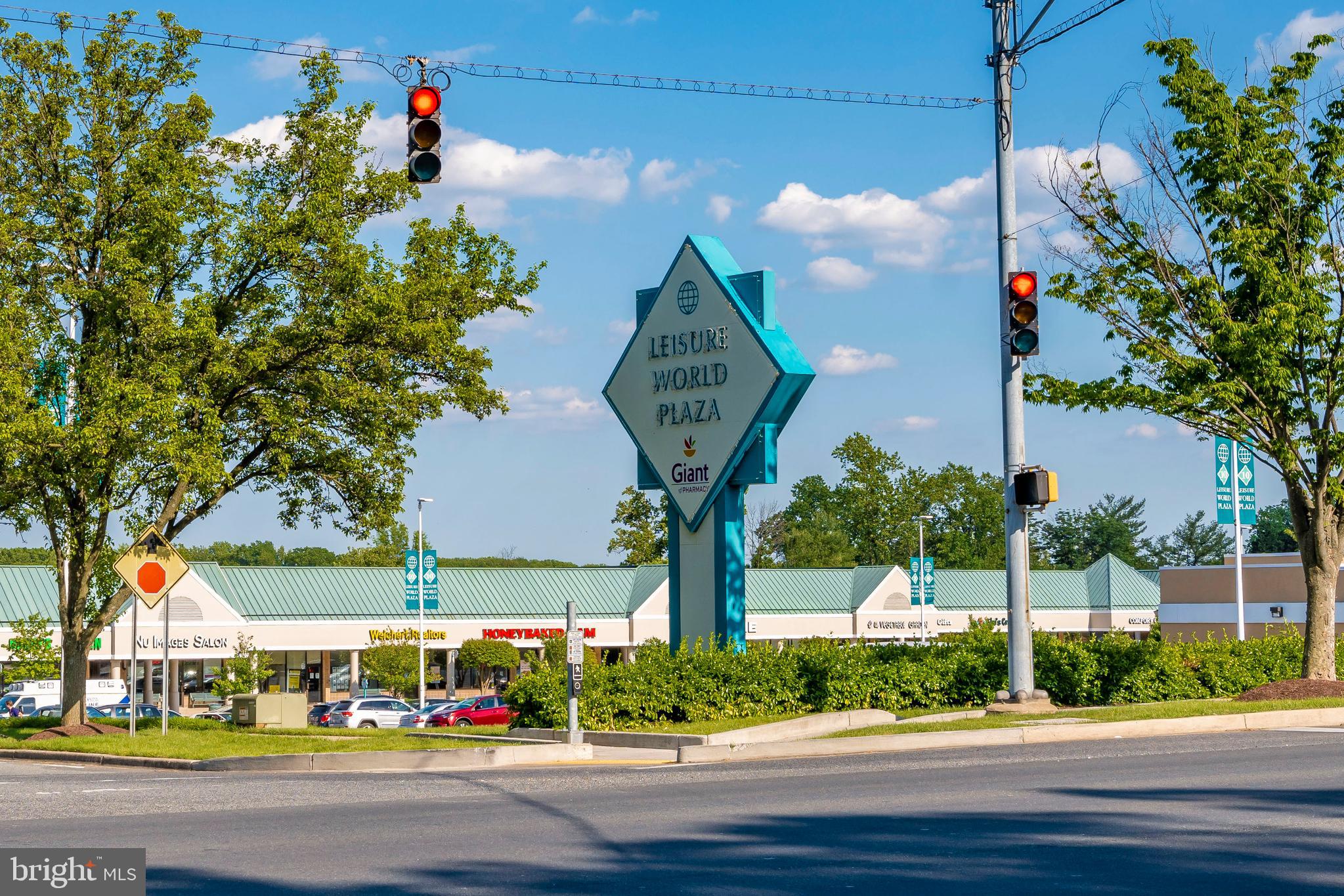 3005 South Leisure World Boulevard, Unit 306 Silver Spring, MD 20906 - Photo 64 of 71 a front view of a house with street