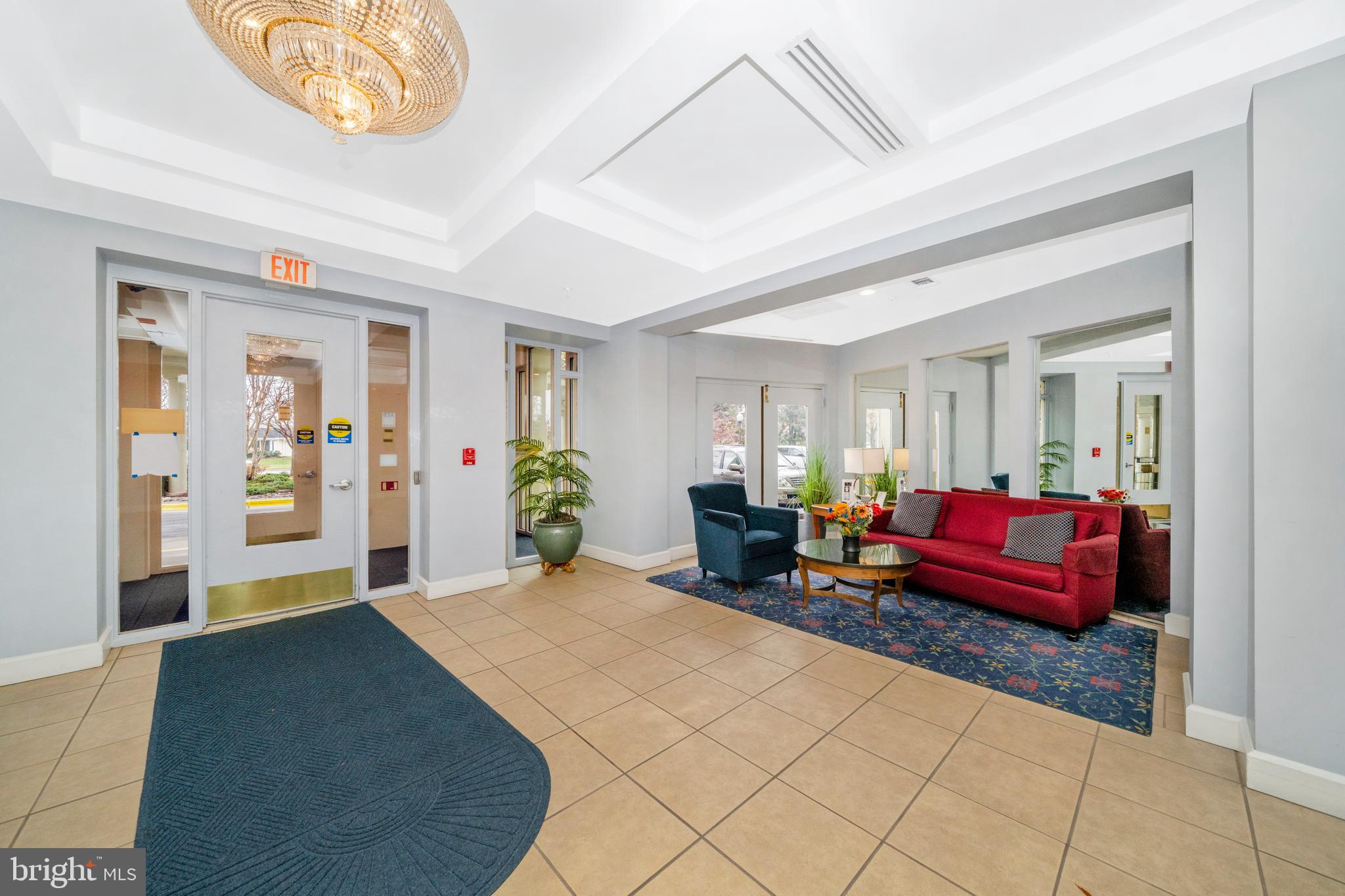 3005 South Leisure World Boulevard, Unit 306 Silver Spring, MD 20906 - Photo 71 of 71 a bedroom with furniture and a potted plant
