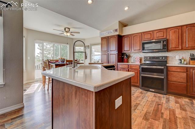 9470 Rockingham Drive Peyton, CO 80831 - Photo 7 of 39 kitchen island