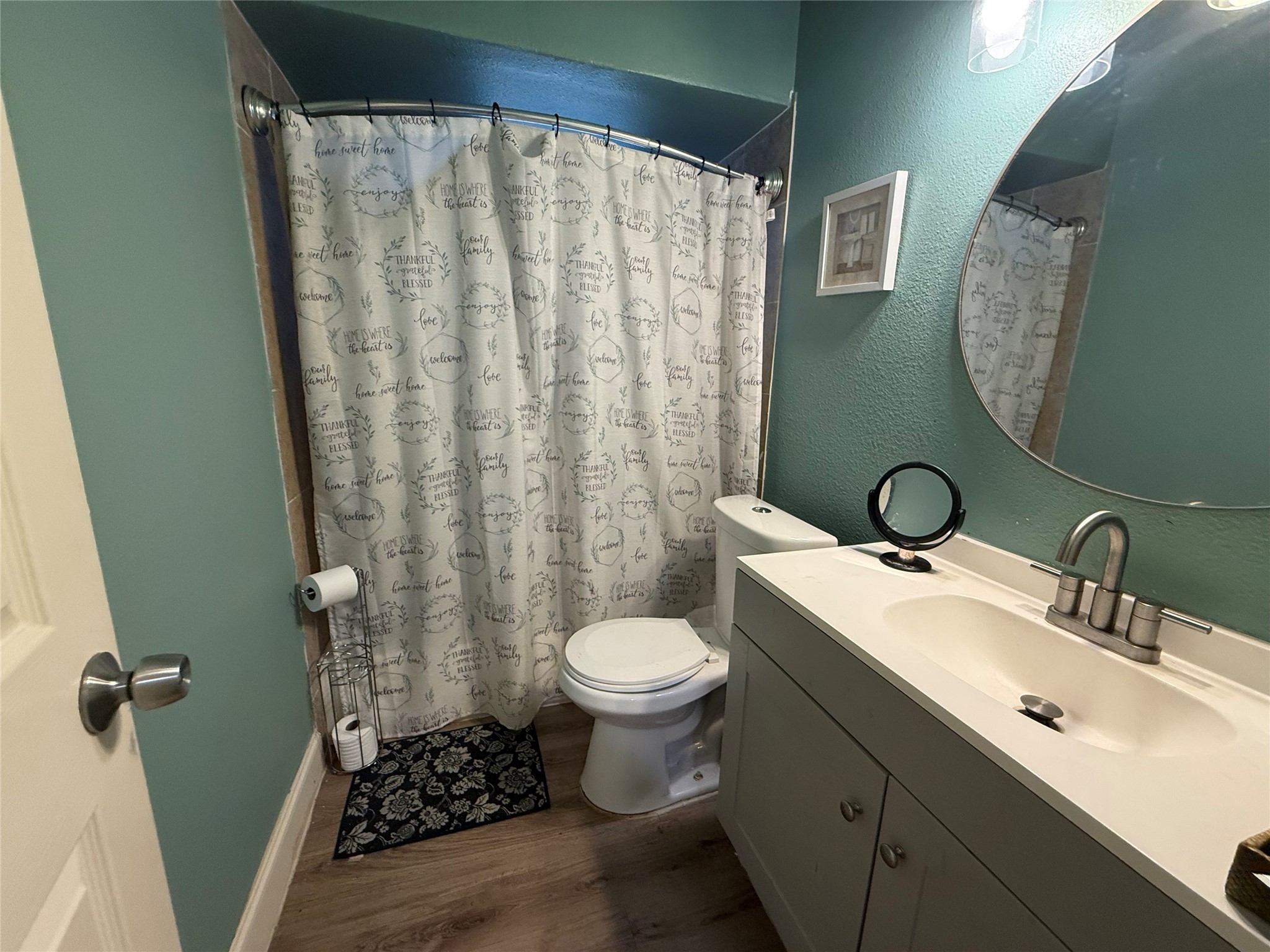 8823 Shadow Crest Street Houston, TX 77074 - Photo 7 of 14 a bathroom with a sink toilet and shower