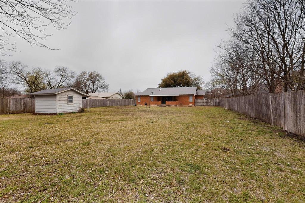 210 North Summit Street Red Oak, TX 75154 - Photo 21 of 24 This home has a very large lot for endless possibilities.