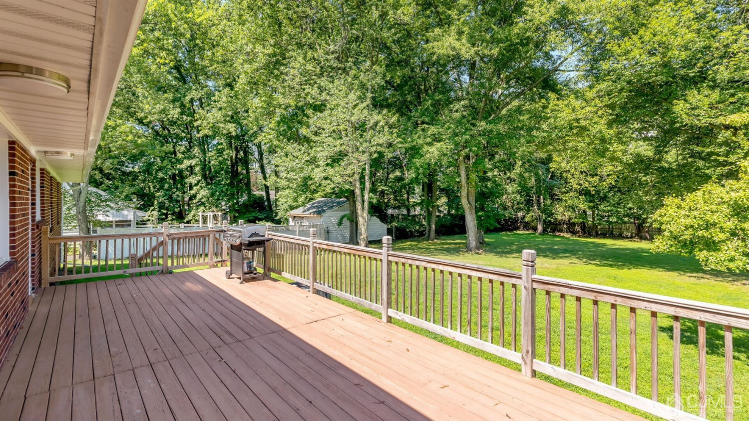 1223 Cushing Road Plainfield, NJ 07062 - Photo 22 of 25 a view of balcony with deck and wooden floor
