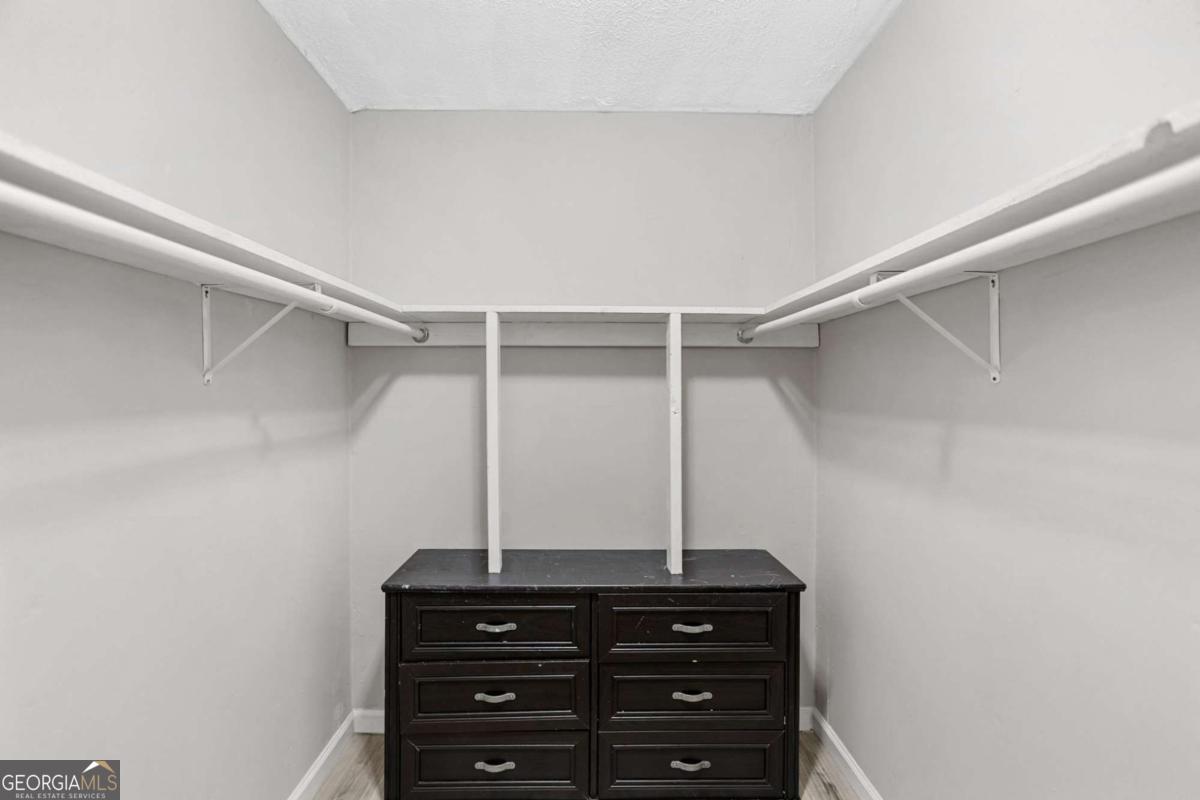 1248 Cannonville Road LaGrange, GA 30240 - Photo 23 of 46 a view of a closet with wooden floor