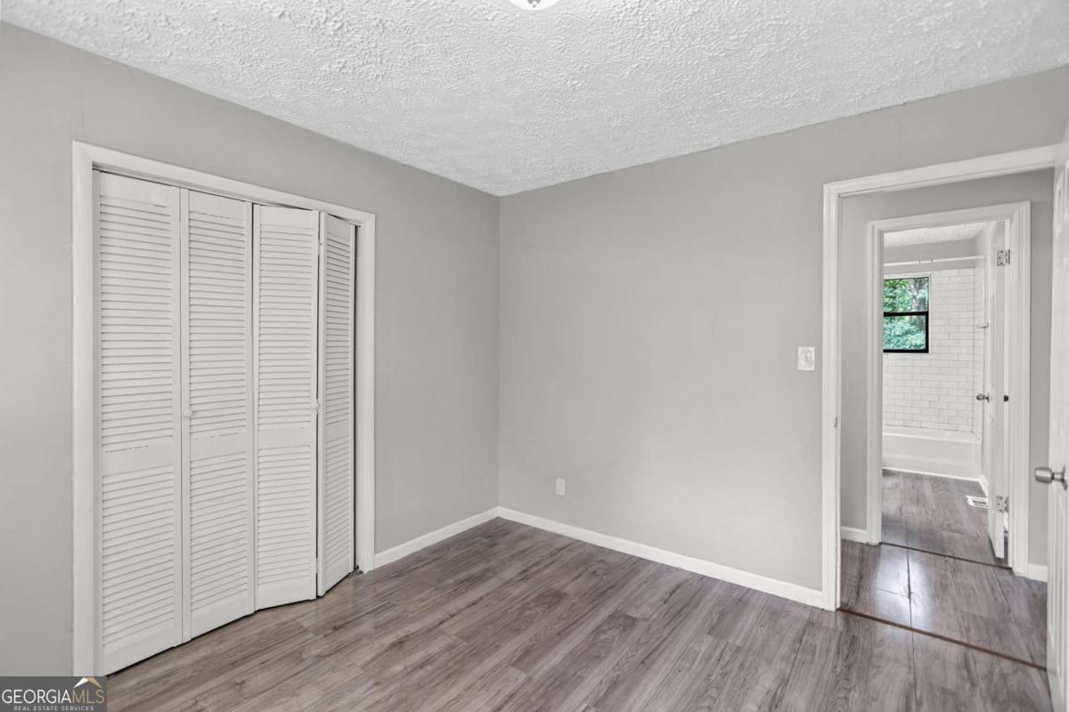 1248 Cannonville Road LaGrange, GA 30240 - Photo 28 of 46 wooden floor in an empty room