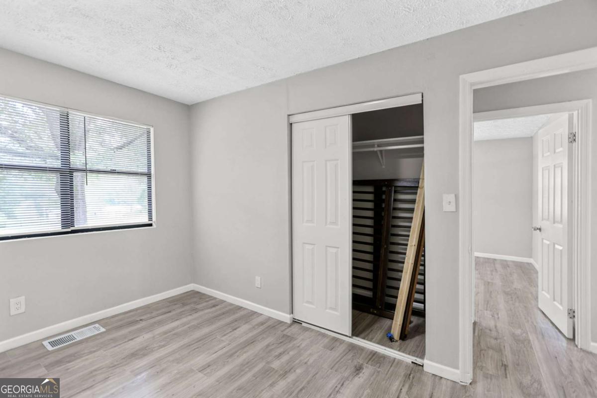 1248 Cannonville Road LaGrange, GA 30240 - Photo 32 of 46 an empty room with wooden floor
