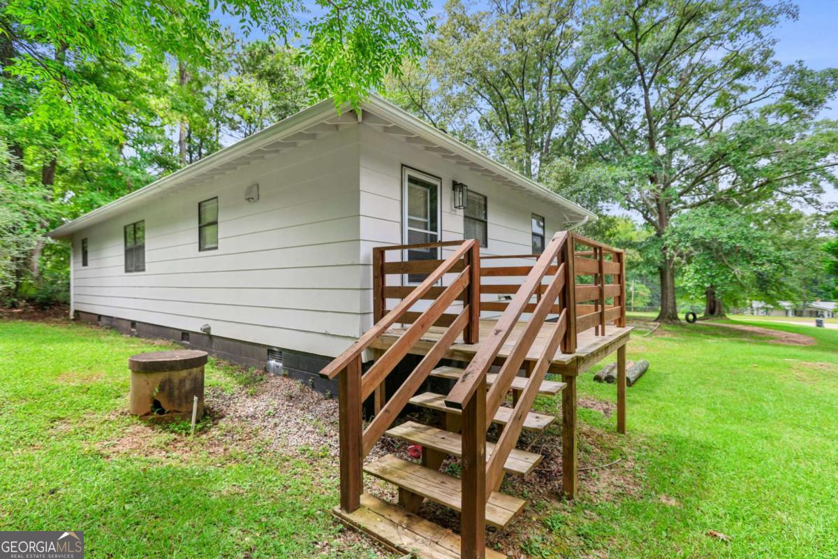 1248 Cannonville Road LaGrange, GA 30240 - Photo 36 of 46 a backyard of a house with table and chairs