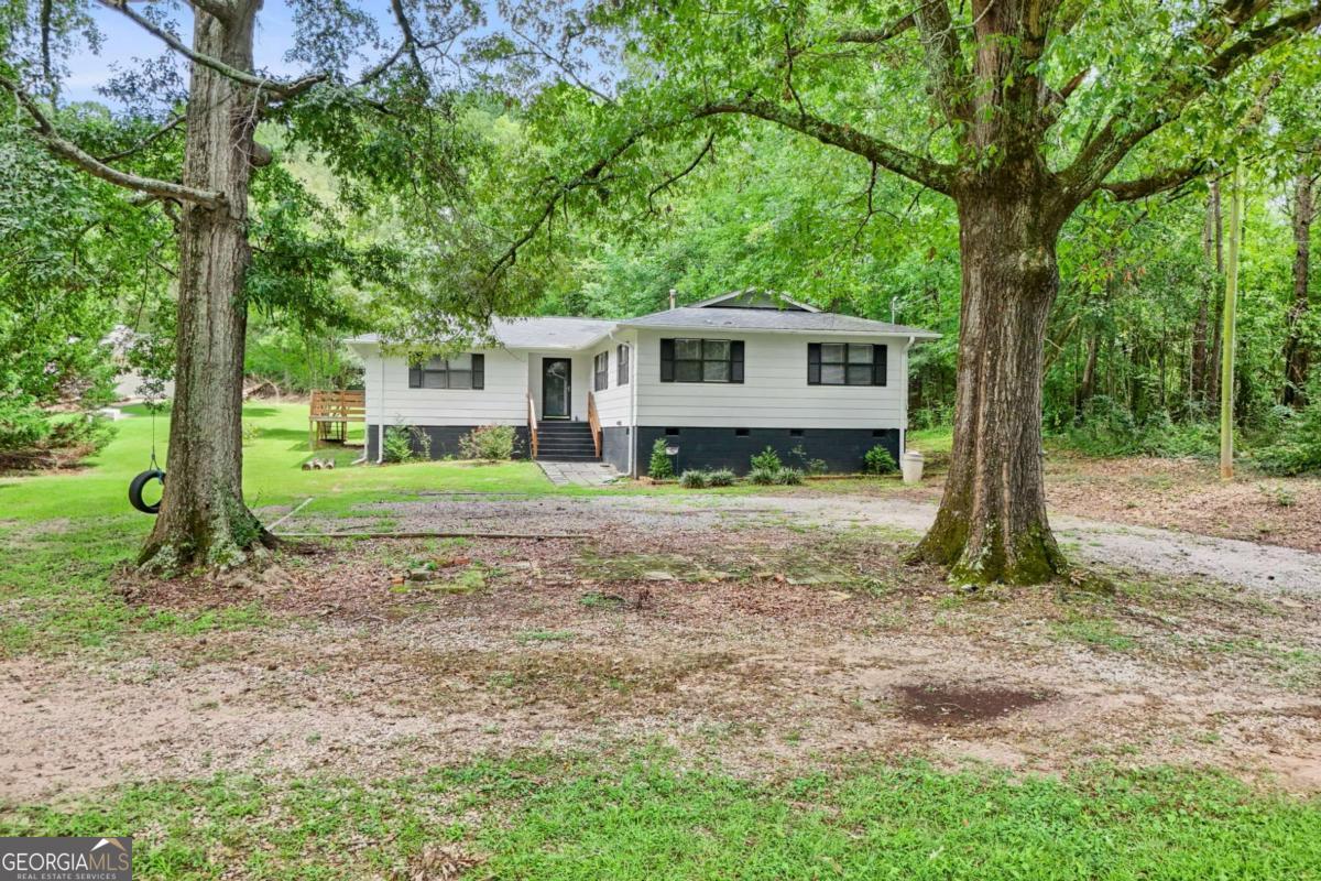 1248 Cannonville Road LaGrange, GA 30240 - Photo 4 of 46 a front view of a house with a yard