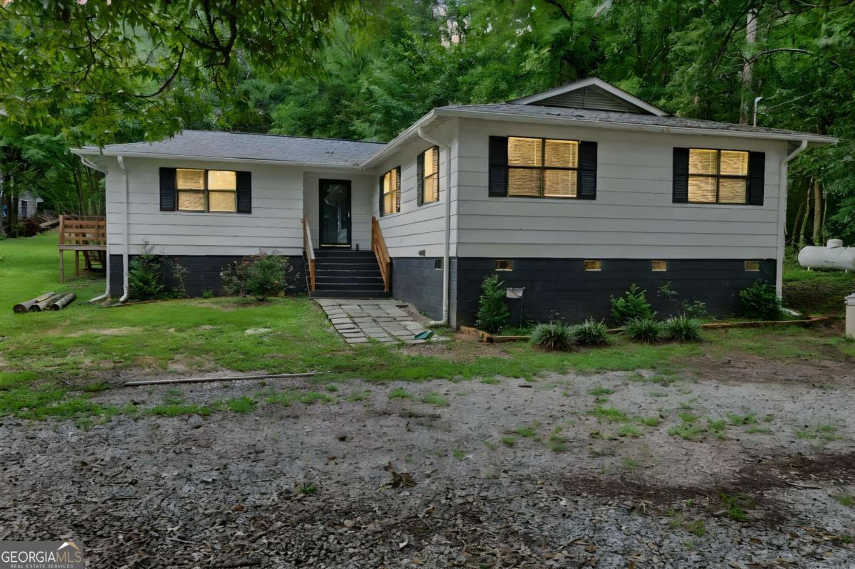 1248 Cannonville Road LaGrange, GA 30240 - Photo 46 of 46 a front view of a house with garden