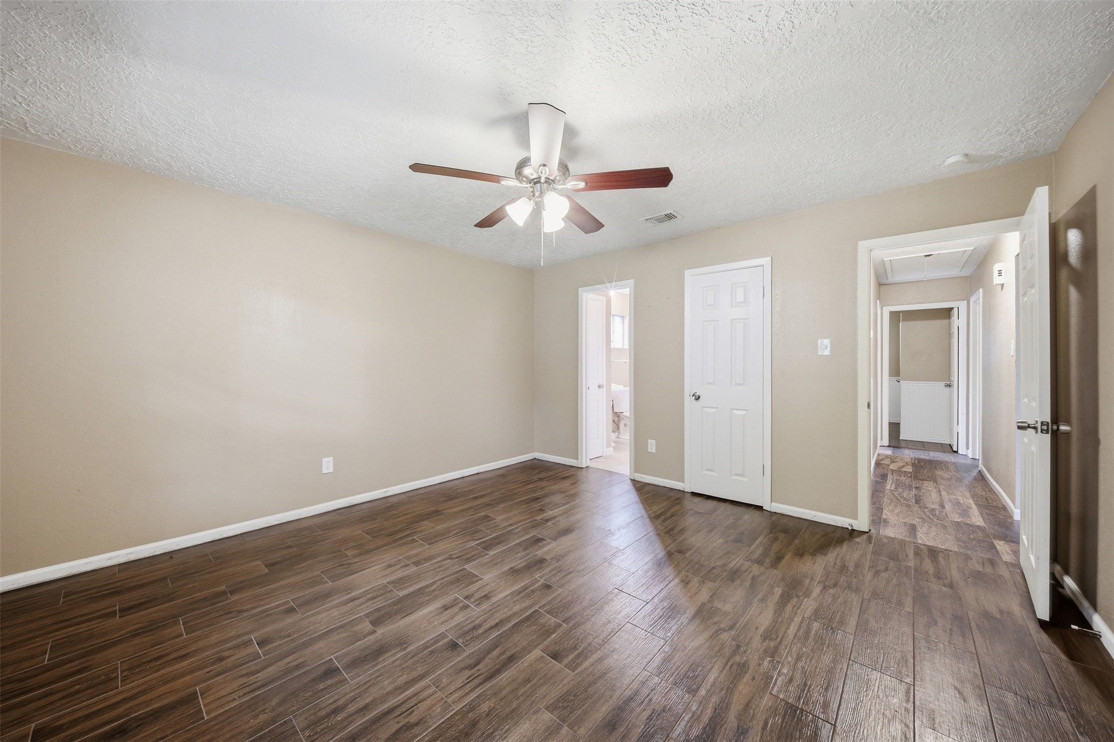 9418 Kilrenny Drive Spring, TX 77379 - Photo 11 of 47 a view of an empty room with wooden floor