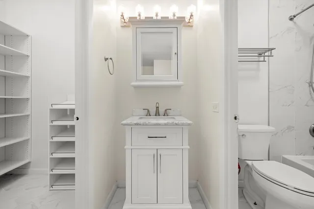 a view of an empty walk in closet