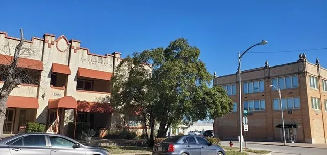 a street sign on a pole on a street