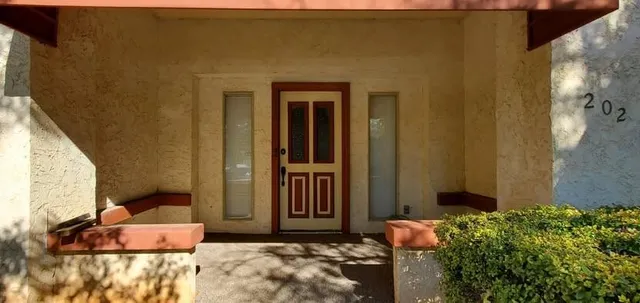 a front view of a house with entryway