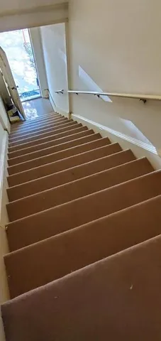 a view of a room with stairs