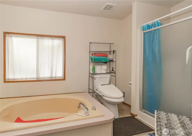 a bathroom with a sink and toilet