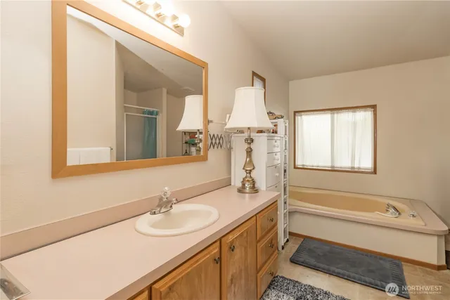 a bathroom with a sink and a bathtub