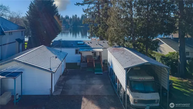 a view of a patio in backyard