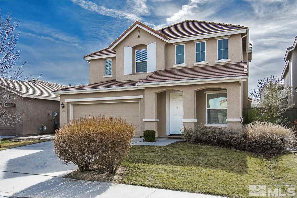 1738 Cavern Drive Reno, NV 89521 - Photo 1 of 1 a front view of a house with garden