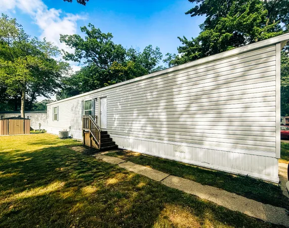 $69,900 | 14787 Apple Drive, Unit 403, Fruitport, MI 49415
