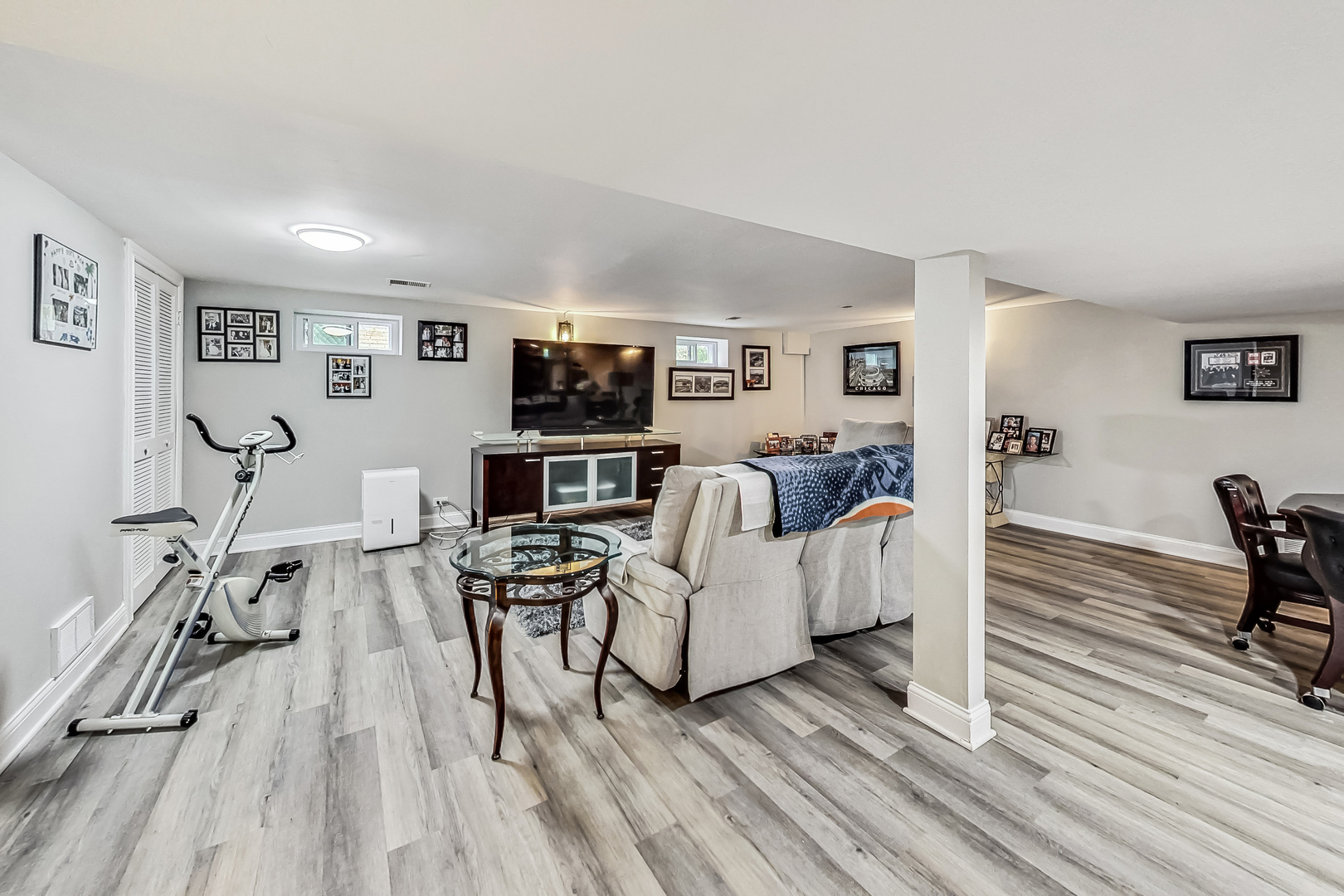 1409 Lahon Street Park Ridge, IL 60068 - Photo 11 of 21 a living room with furniture and a flat screen tv