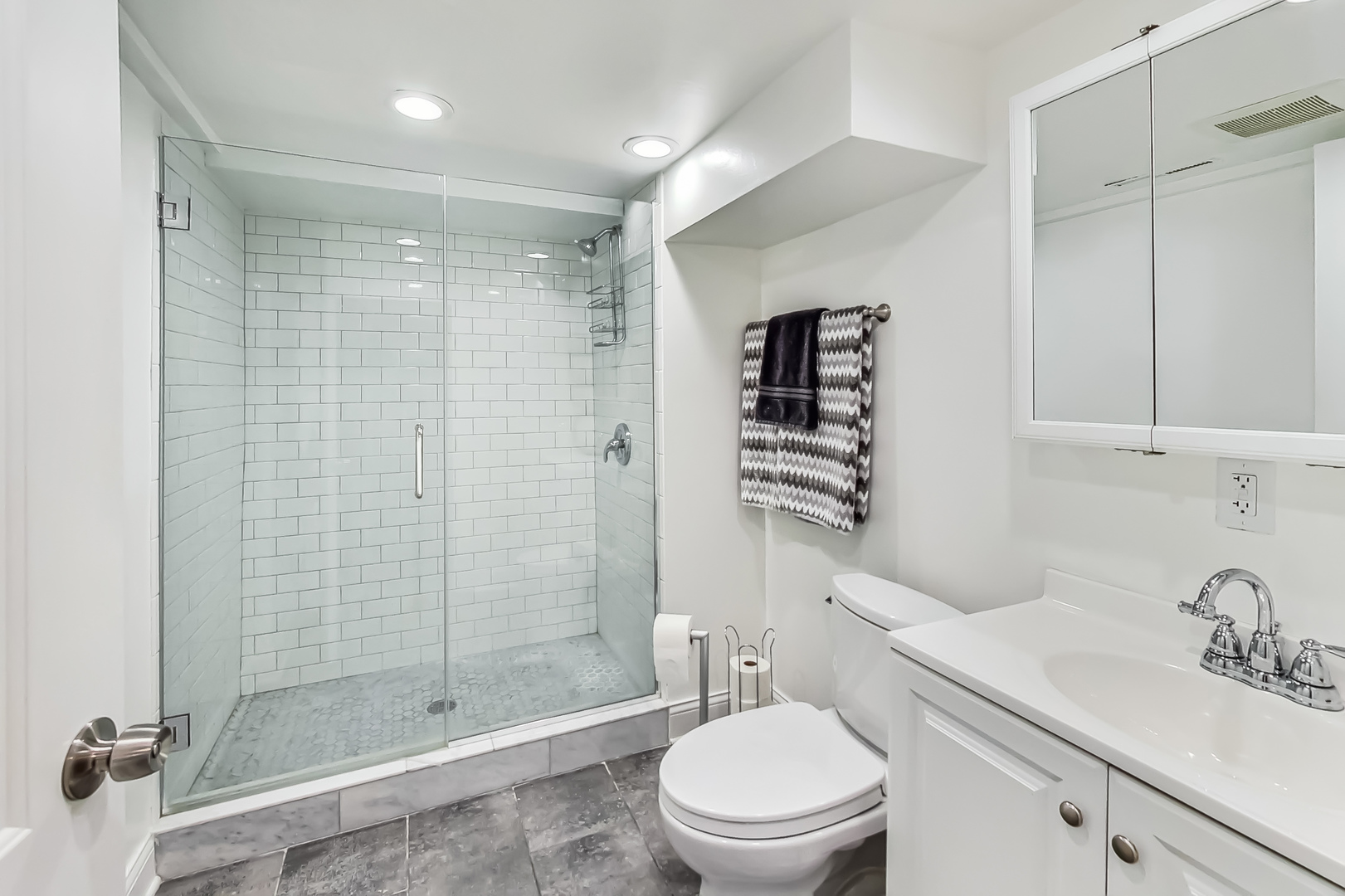 1409 Lahon Street Park Ridge, IL 60068 - Photo 14 of 21 a bathroom with a sink a toilet and shower