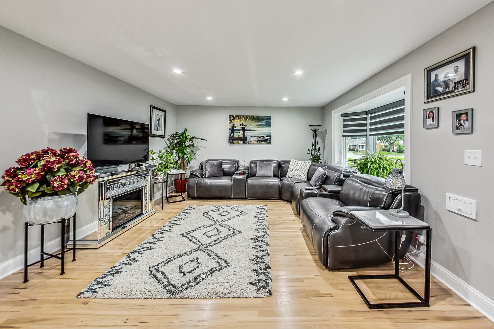 1409 Lahon Street Park Ridge, IL 60068 - Photo 3 of 21 a living room with furniture wooden floor and a flat screen tv