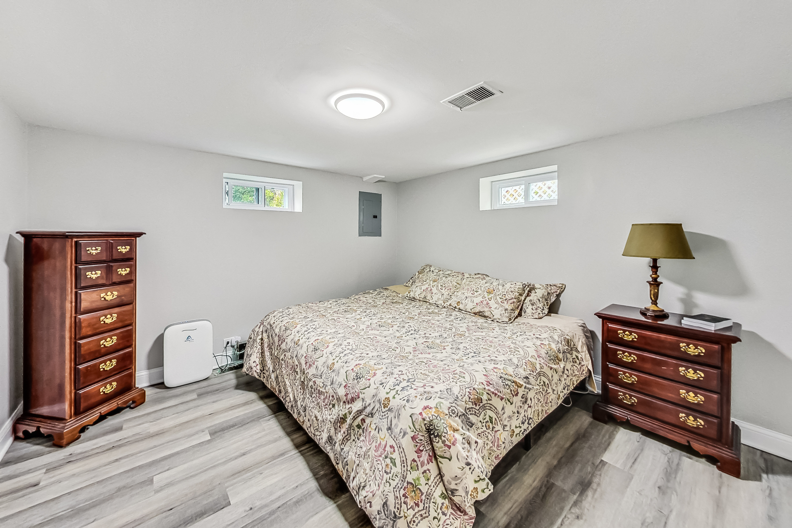 1409 Lahon Street Park Ridge, IL 60068 - Photo 9 of 21 a bedroom with a bed and a dresser