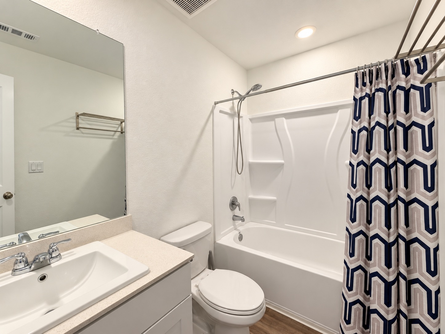14409 Treyvon Road Manor, TX 78653 - Photo 11 of 21 Attached en-suite bathroom to primary bedroom.
