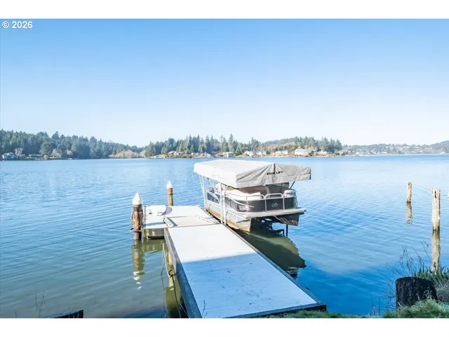 a living room with a couch and a large window
