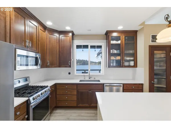 a bedroom with a bed and a table with closet