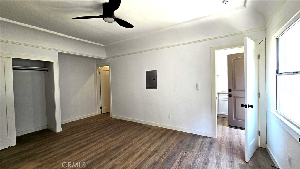 973 North Pk Circle Long Beach, CA 90813 - Photo 2 of 8 a view of an empty room with wooden floor