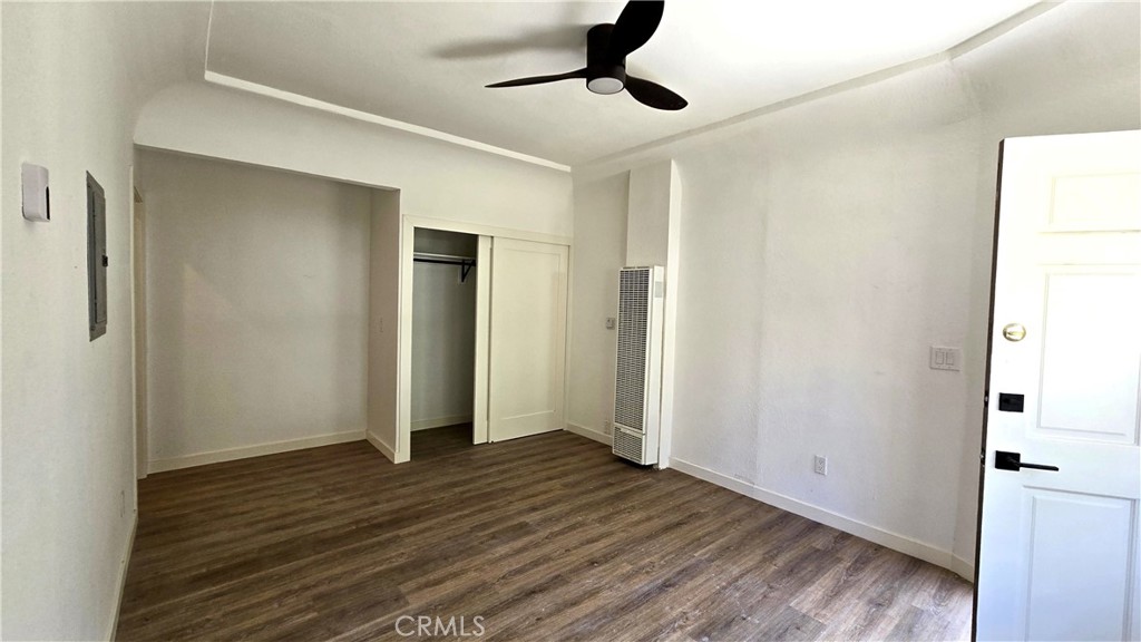 973 North Pk Circle Long Beach, CA 90813 - Photo 7 of 8 a view of an empty room with wooden floor