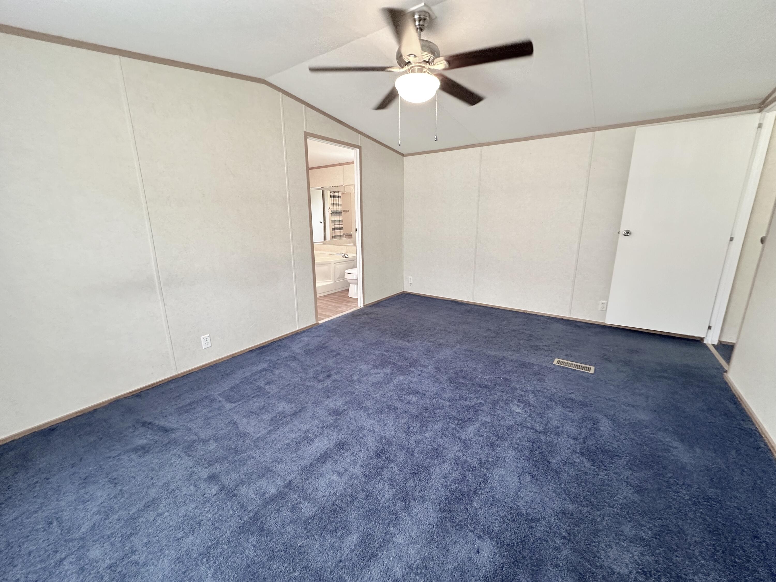 123 Marigold Avenue DeFuniak Springs, FL 32433 - Photo 19 of 45 a view of empty room with ceiling fan