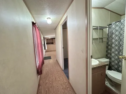a bathroom with a bathtub and shower