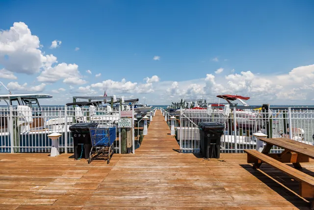a view of a swimming pool with seating area