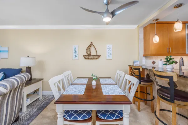 a view of a dining room with furniture
