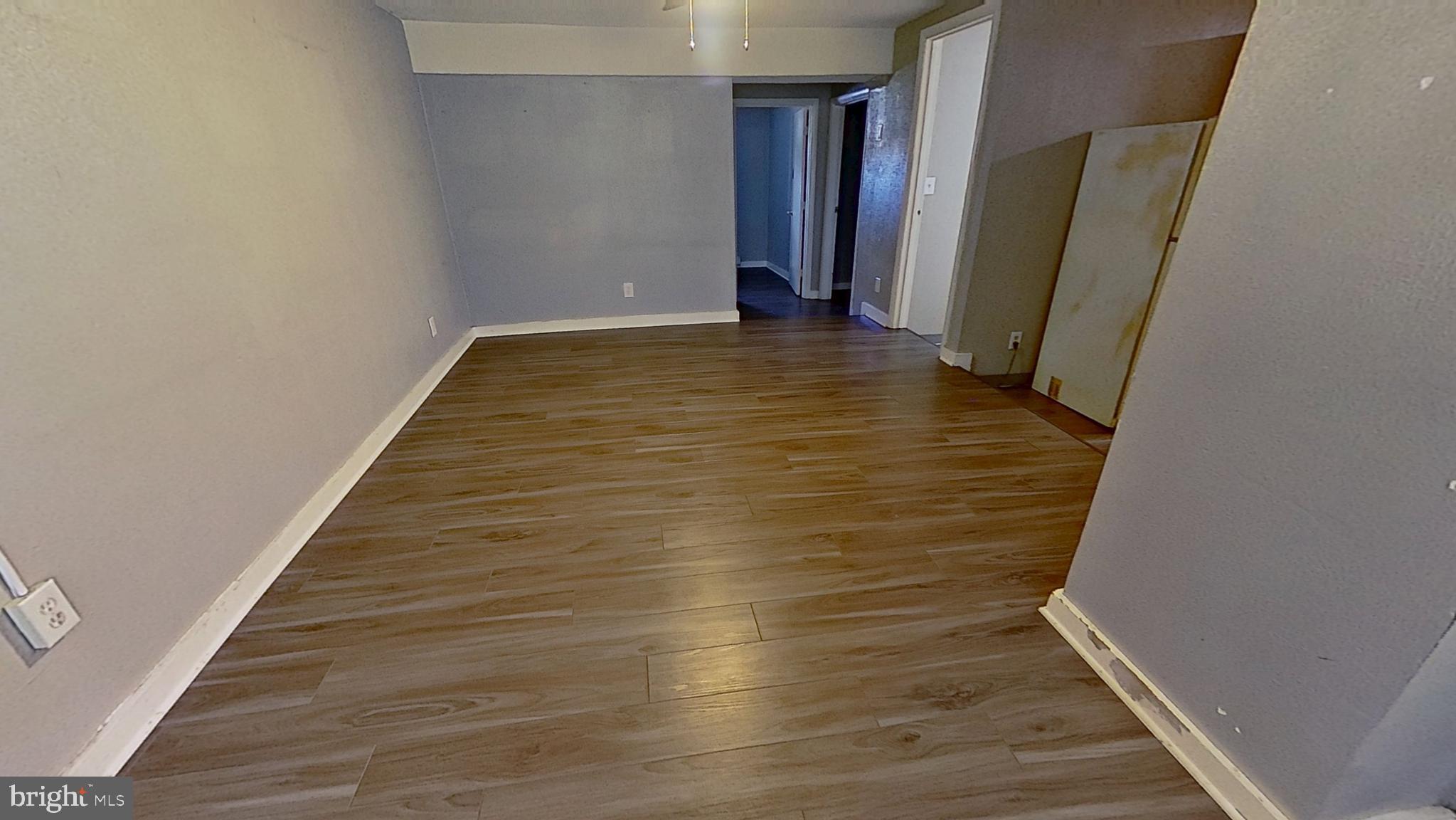 155 West Main Street, Unit 17 Windsor, PA 17366 - Photo 2 of 8 a view of a hallway with wooden floor