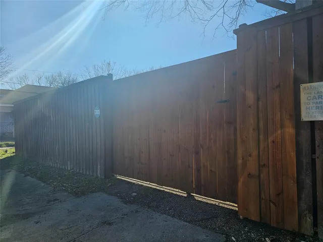 an empty room with a wooden door