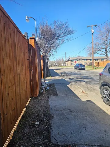 a view of a backyard of a house
