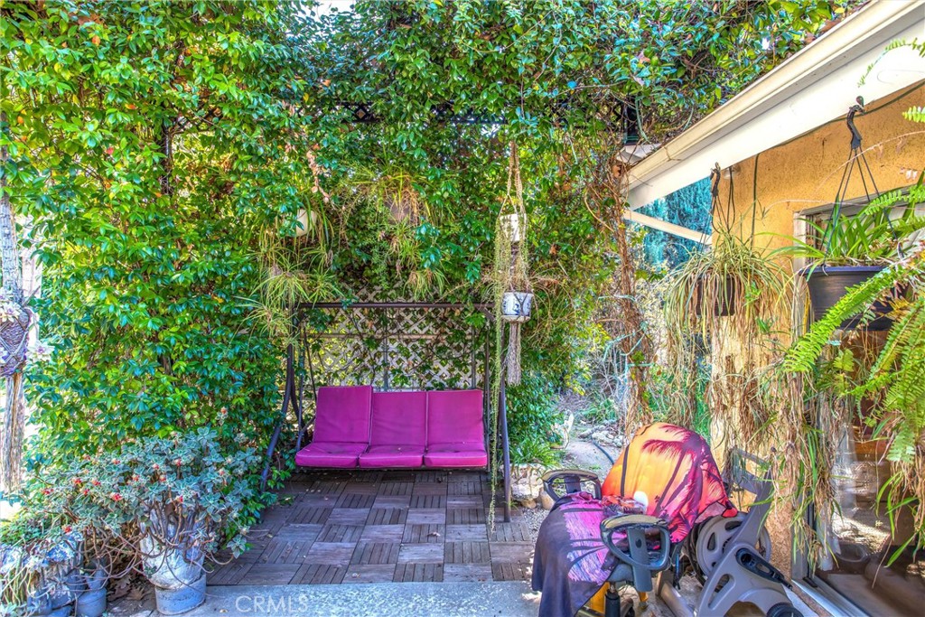13503 Mulberry Circle Yucaipa, CA 92399 - Photo 21 of 28 a view of a two chairs in the patio